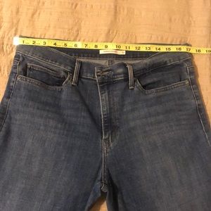 Levi’s Slimming Straight waist 33 length 30.  Worn twice.  Like new condition.